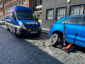 Car tyre change at workplace in London, Essex, Kent. Yellow Tyres